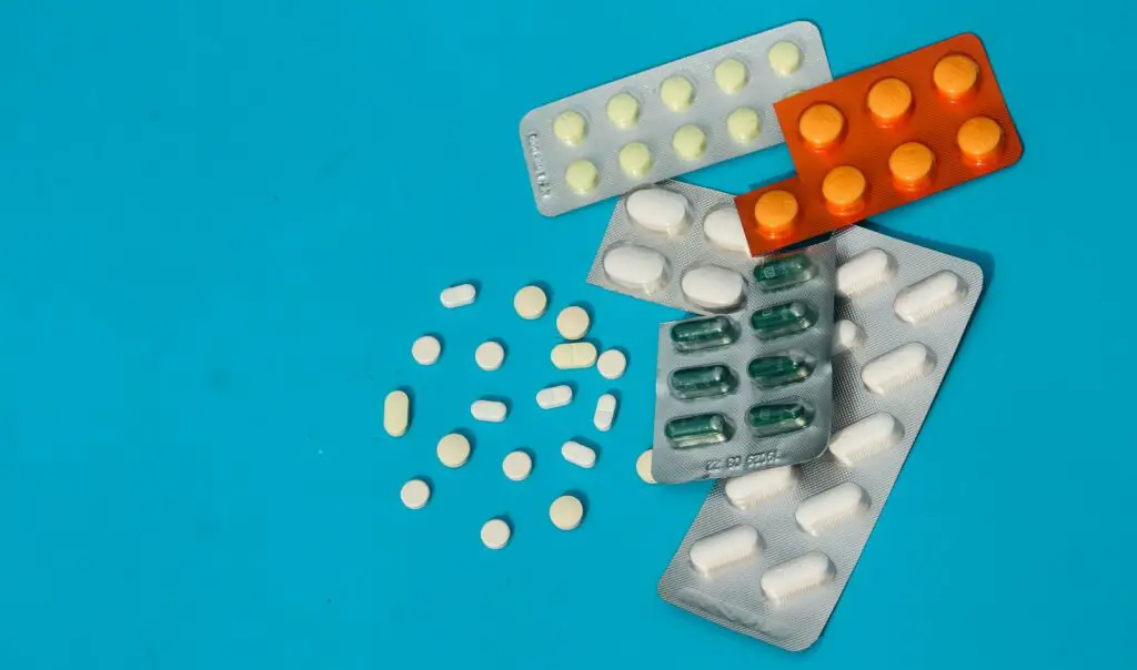 white and orange medication pill blister pack