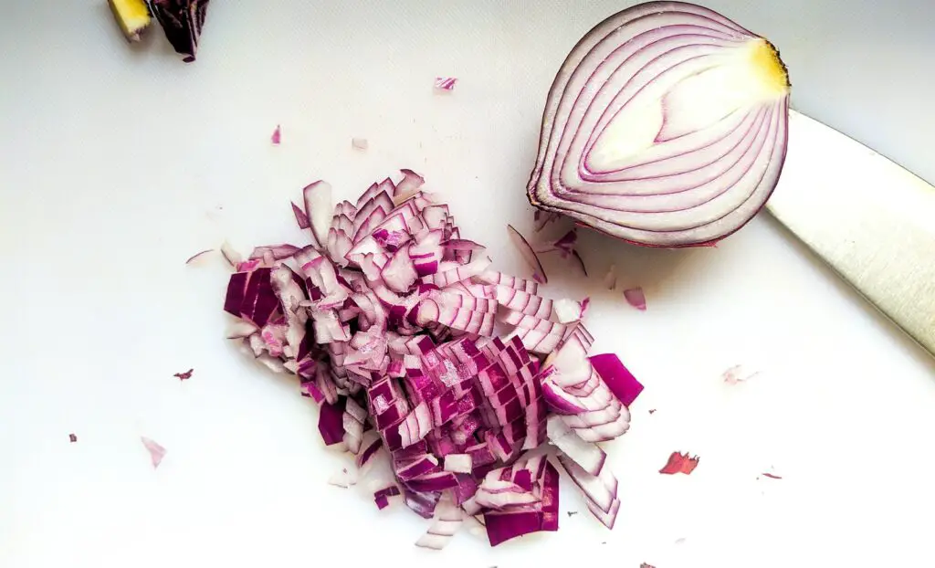 sliced onions on white surface